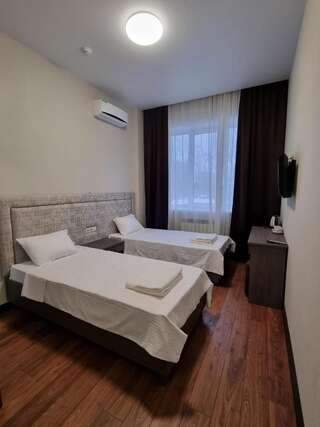 Отель Hotel Nova Липецк Двухместный номер с 2 отдельными кроватями-4
